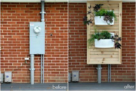 creative ways to cover electrical box on concrete patio|how to hide a utility box.